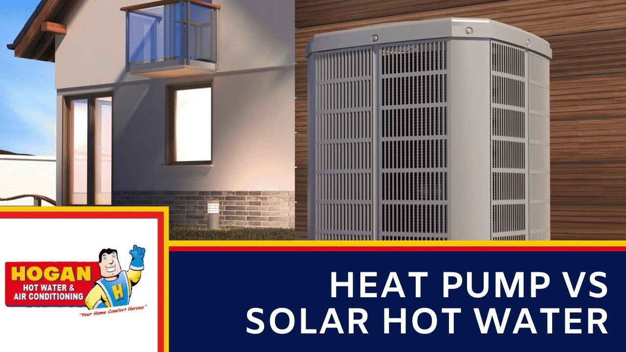 A large outdoor heat pump unit situated next to a modern house with wood-panelled accents.