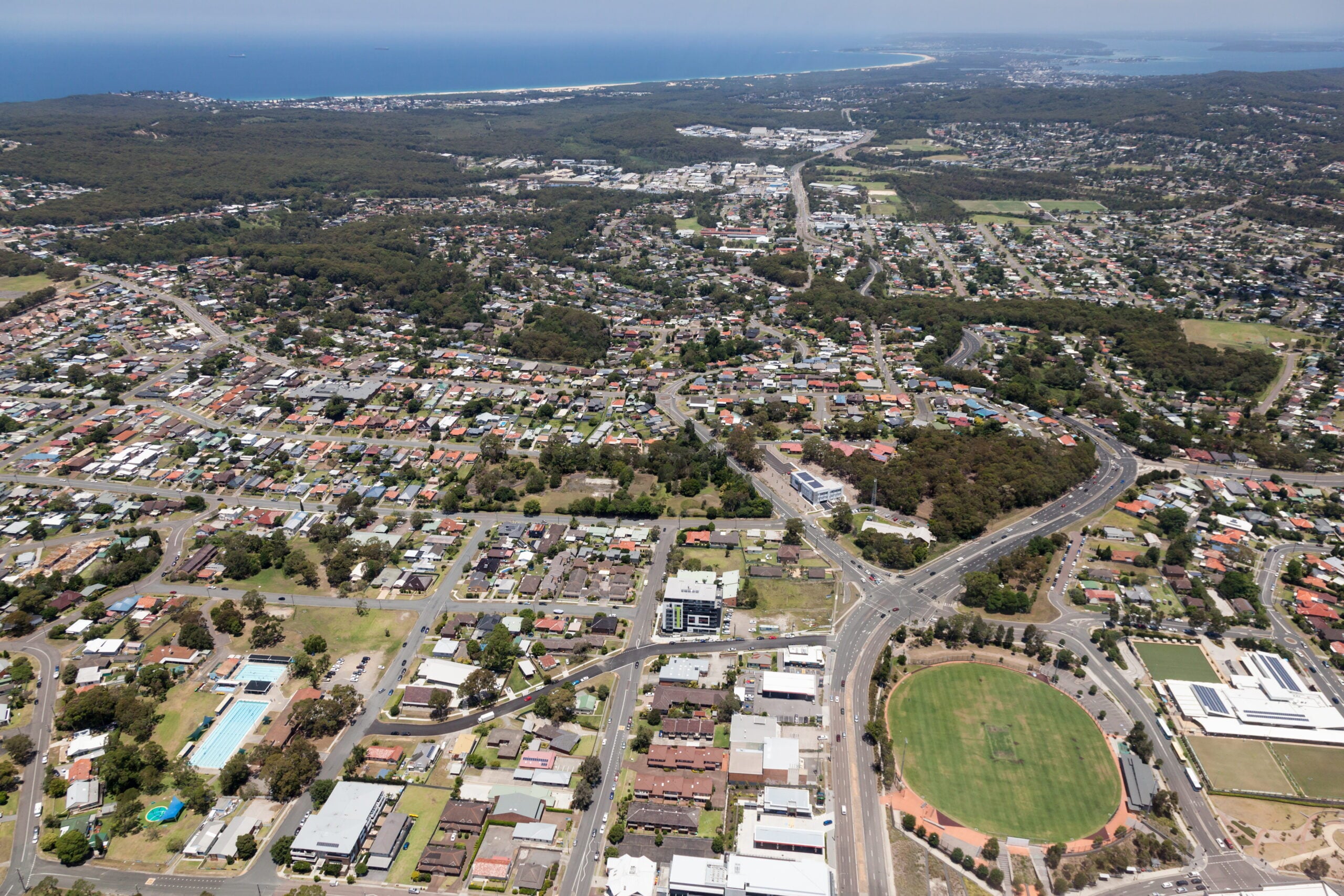 Aerial view of residential areas of Newcastle and Lake Macquarie. Charlestown Whitebridge and Gateshead surburbs looking south towards Readhead Beach and Lake Macquarie.