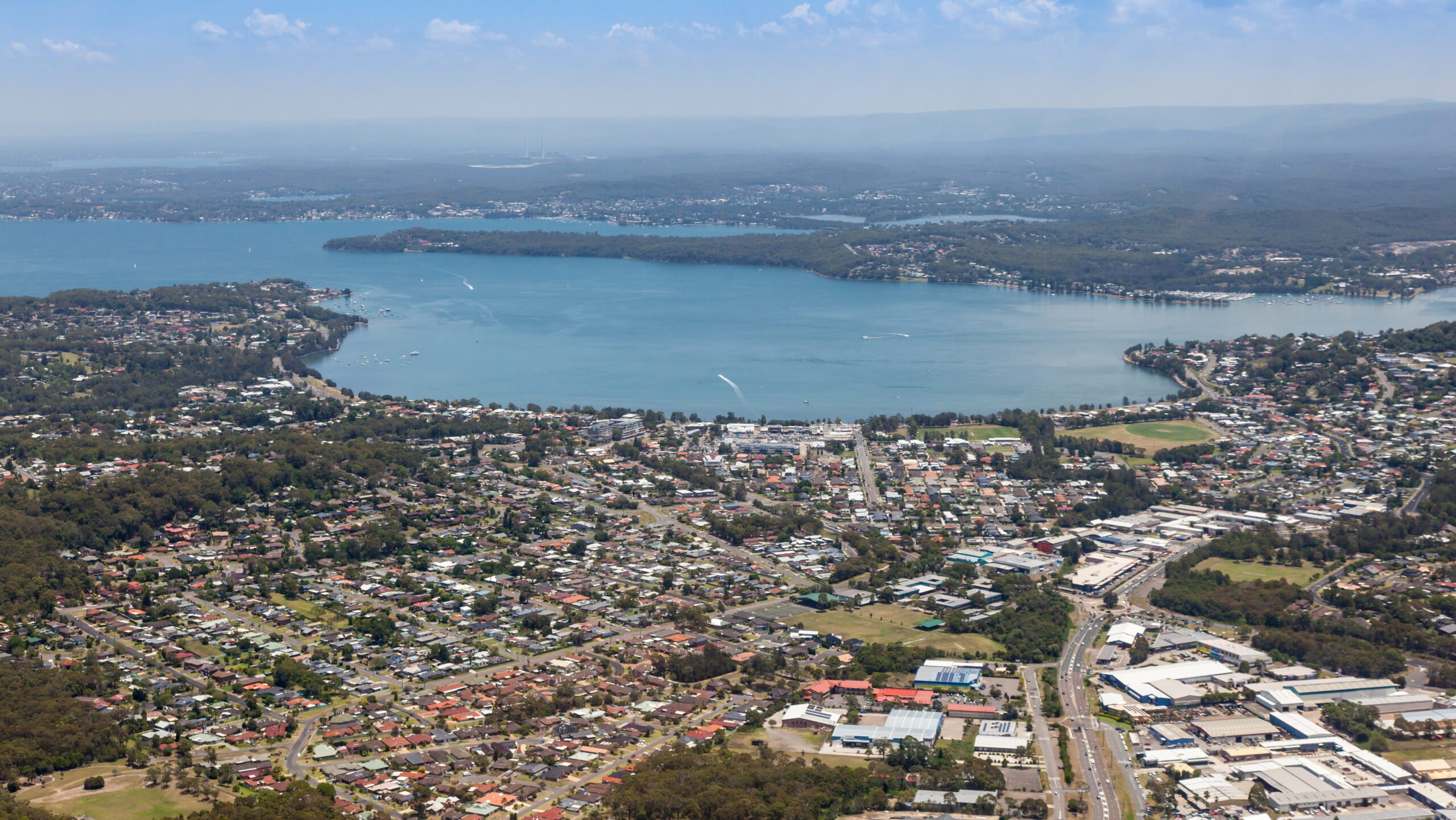 An expansive aerial view of a coastal town