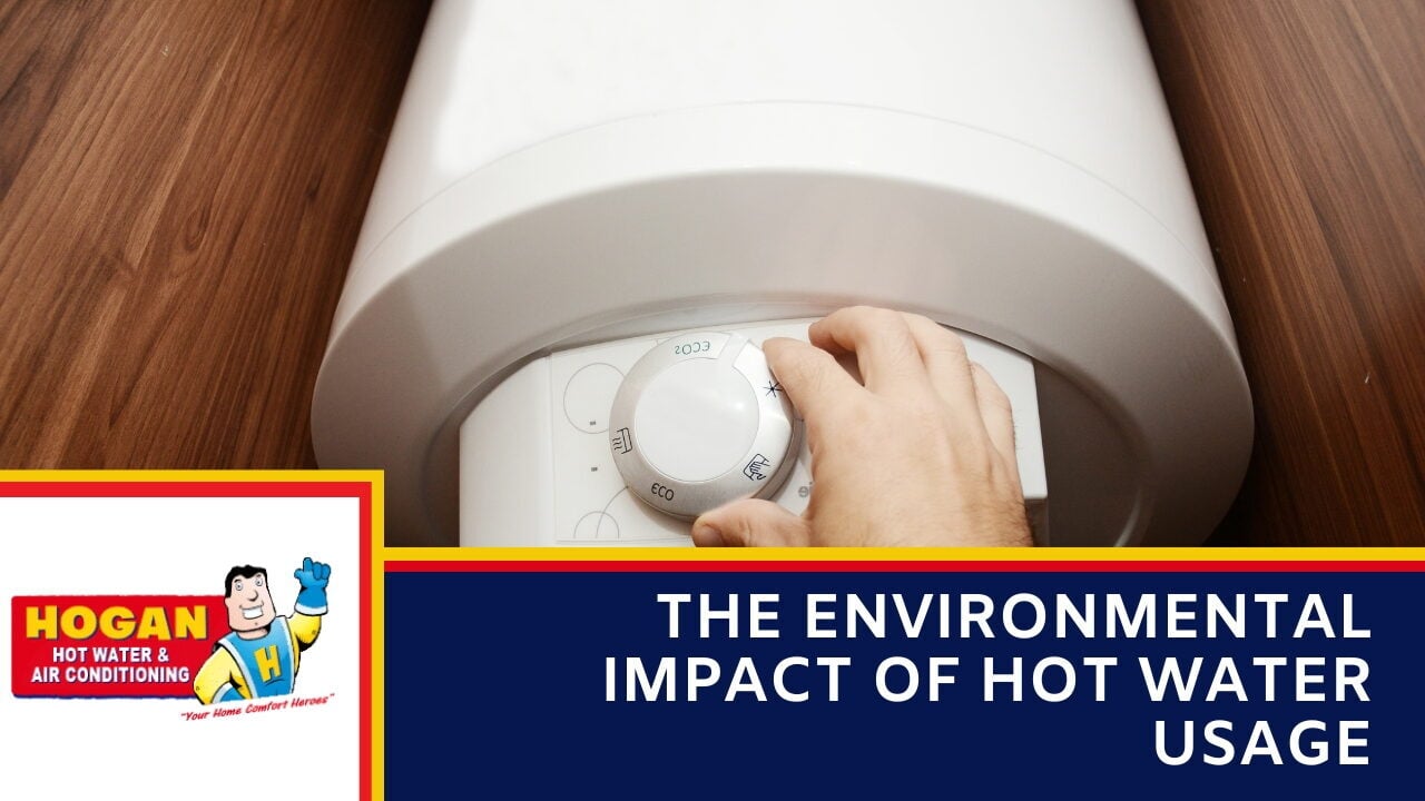 A hand adjusting the temperature dial on a white electric storage water heater with visible "ECO" settings.