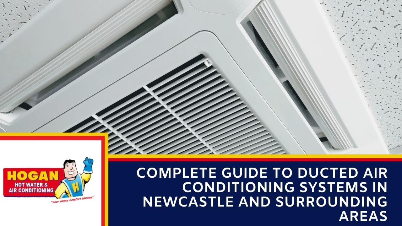A white ceiling-mounted ducted air conditioning vent