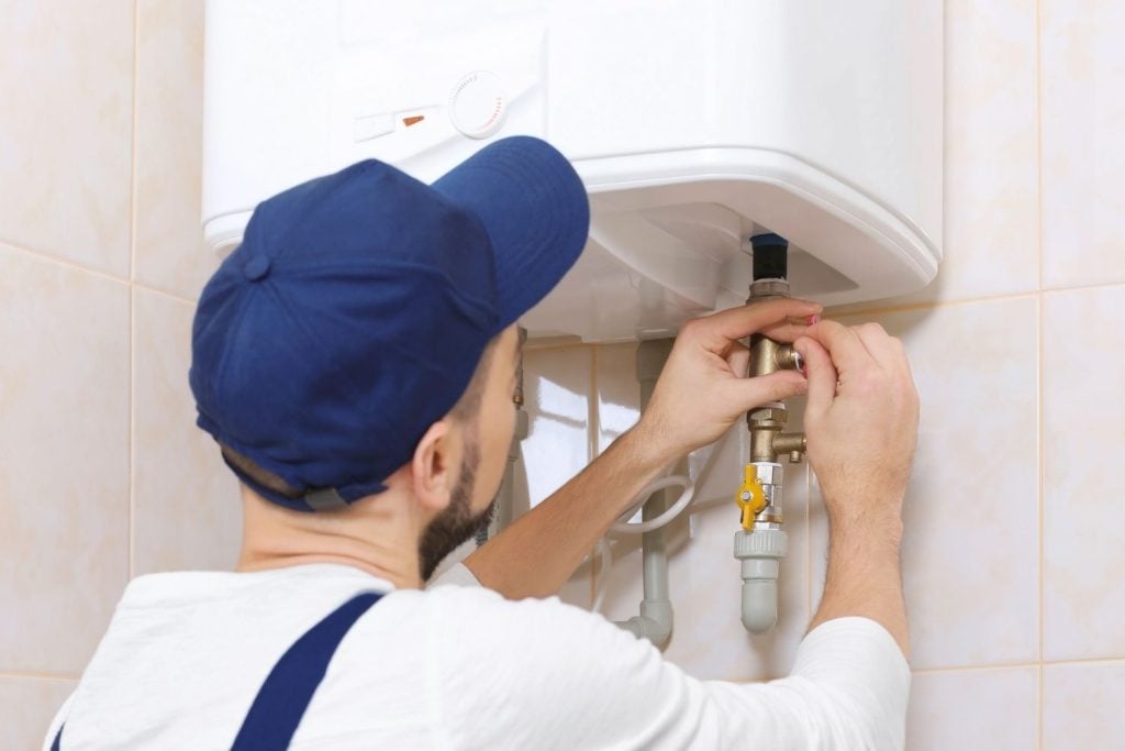 Hot Water Installation and Maintenance Beresfield » Beresfield Plumber Repairing a Water Heater