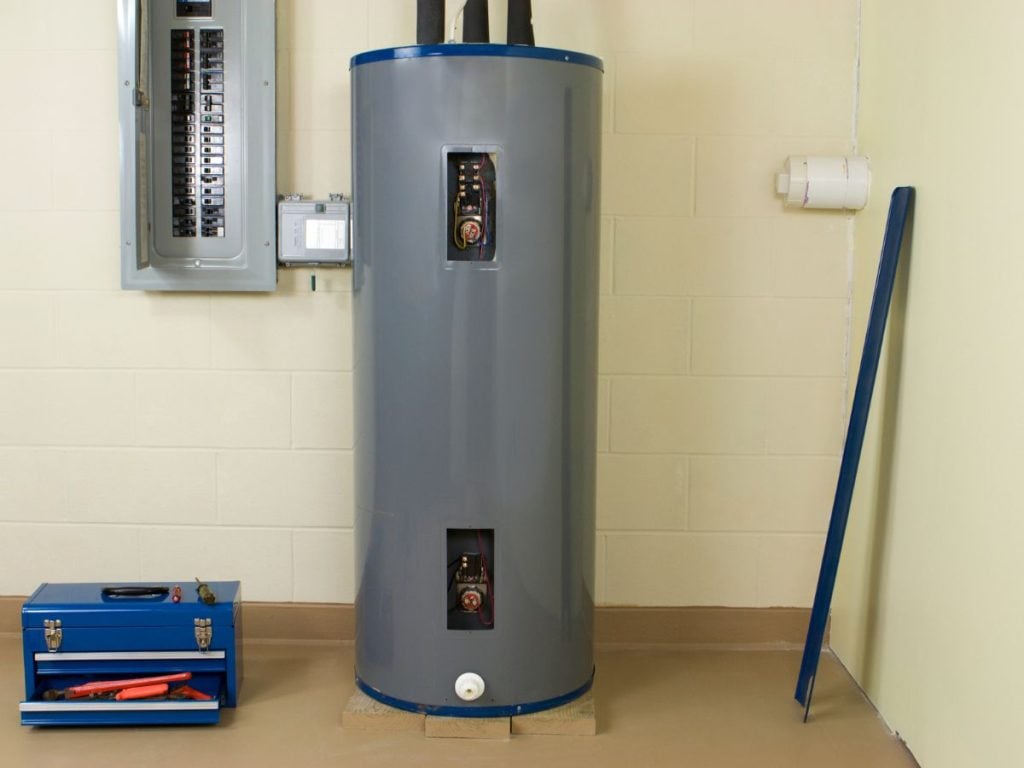 Hot Water Installation and Maintenance Mayfield » Mayfield A wide view of a large, grey cylindrical electric hot water storage tank.