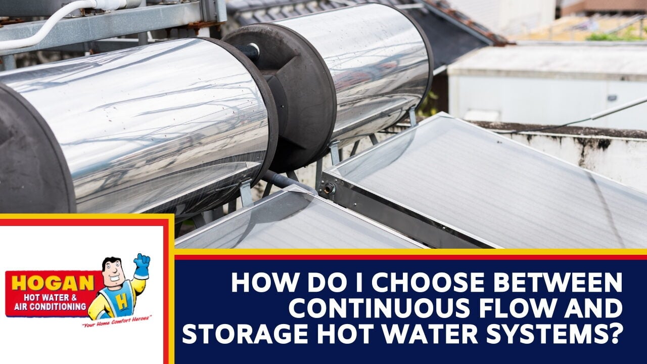 A close-up view of rooftop solar water heater panels and two stainless steel storage cylinders.