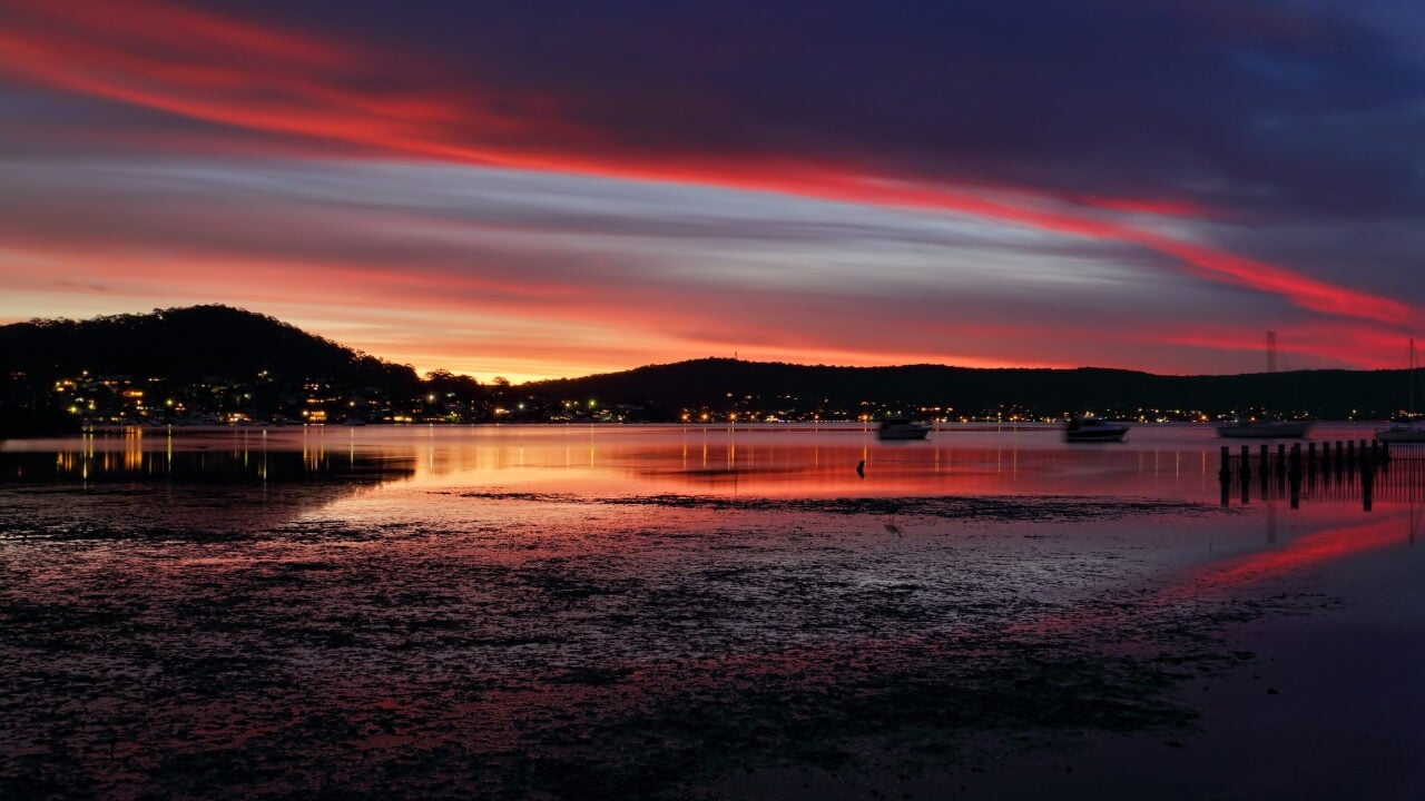 A calm bay at twilight in Yattalunga