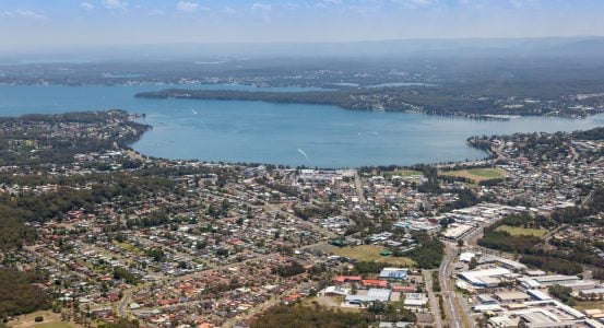An expansive aerial view of a coastal town